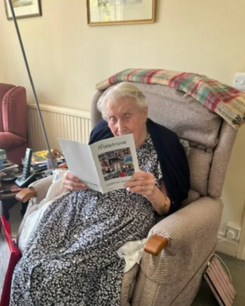 A Taletrove reader with their newsletter